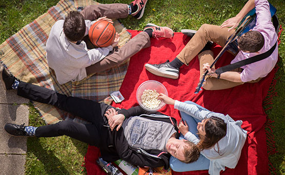 Students having a picnic.