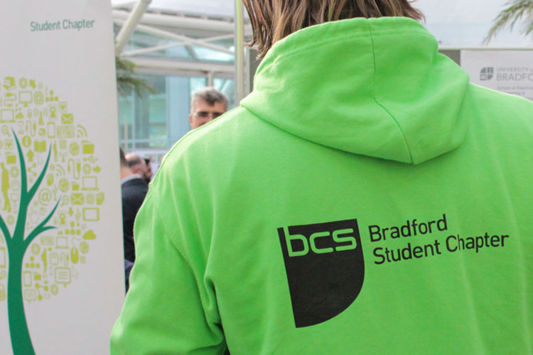 A student wearing a Bradford Student Chapter hooded top.